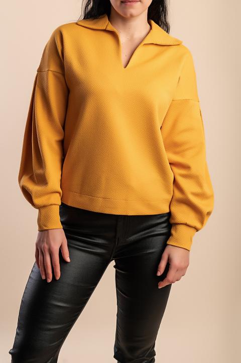 Model na obrázku je vysoký 170 cm